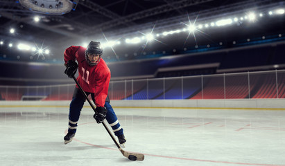 Woman play hockey   . Mixed media