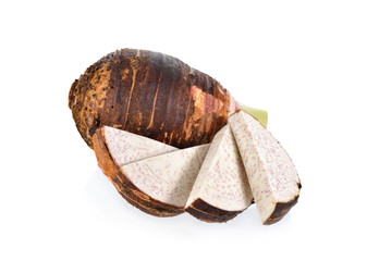 whole and portion cut taro on white background