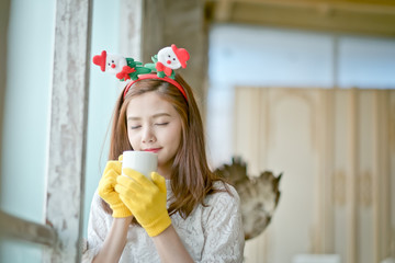 Woman drinking coffee On a bright day.