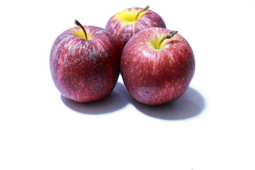 Apple with drop water on the white background