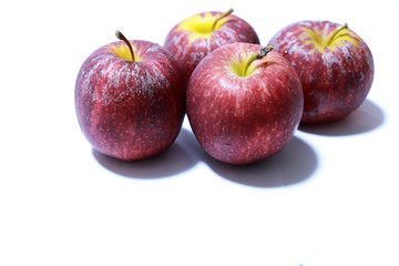 Apple with drop water on the white background