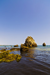 Fototapeta na wymiar beautiful landscape with rocky ocean shore