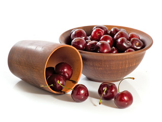 isolated image of cherry in a bow on a white background closeup