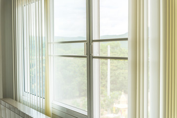 Fototapeta na wymiar Mosqito window screen with white curtains texture