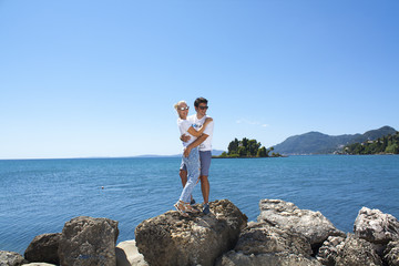 Romantic couple in Corfu island. Holidays in Greece. Mouse island.