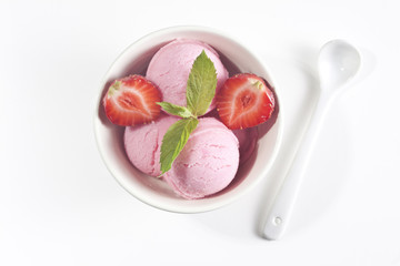 Strawberry ice cream and strawberries.