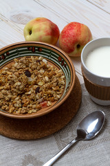 A healthy breakfast: muesli with candied fruit and milk