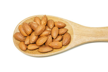 almonds in the wood spoon on white background.