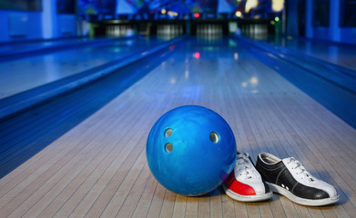 Fototapeta na wymiar shoes, bowling pin and ball for bowling game