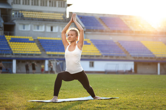 Yoga Woman Doing Warrior Pose