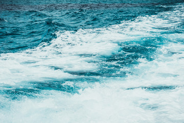 beautiful blue water with white waves
