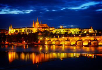 Fototapeta na wymiar skyline of Prague with Vitus cathedral and Charles bridge
