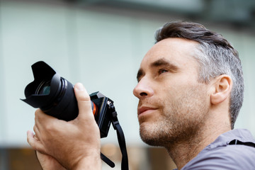 Male photographer taking picture