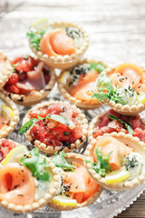 Assortment of canapes. Banquet service.