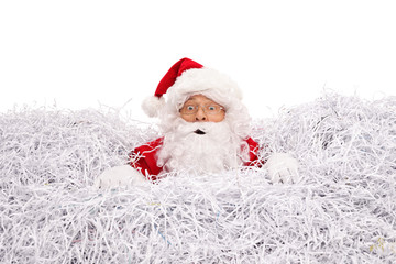 Santa drowning in shredded paper