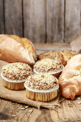 Breads and rolls on wood