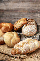 Breads and rolls on wood