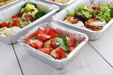 Healthy food in boxes, diet concept.