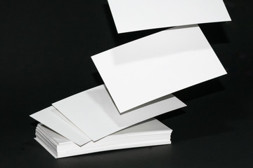 Blank business cards stack fly away to people. the concept for you write everything in this.