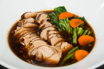 roast pork with sauce and vegetables