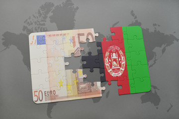 puzzle with the national flag of afghanistan and euro banknote on a world map background.