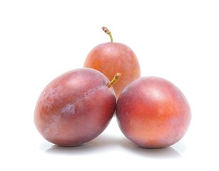 plums isolated on the white background