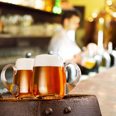 Two glasses of beer in the bar