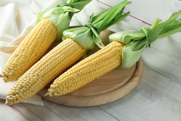 corn on wooden cutting Board