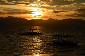 Fototapeta na wymiar Bangka boats during the sunset. Moalboal, Cebu,Philippines 
