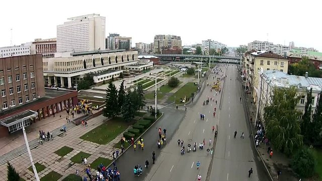 People run a marathon on the main street