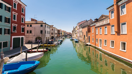 Naklejka na ściany i meble Characteristic canal in Chioggia, lagoon of Venice.