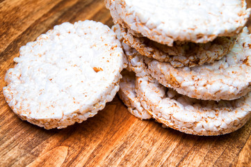 Rice waffles on wooden table