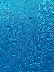 natural water drops on glass