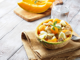Vegan salad with melon and tofu