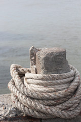 anchor rope tie up the stone pillar