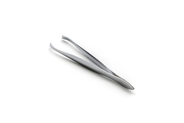 Tweezers of manicure set isolated on white background.