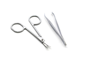 scisor and tweezers isolated on white background