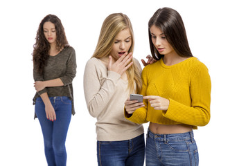 Teenage girls gossiping