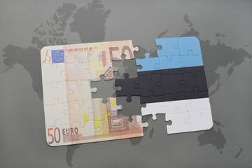 puzzle with the national flag of estonia and euro banknote on a world map background.