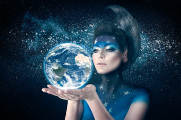 Moon woman holding planet earth