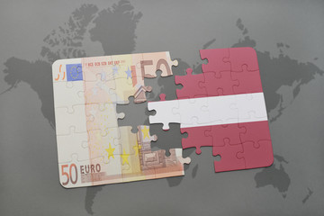 puzzle with the national flag of latvia and euro banknote on a world map background.