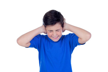Stressed child covering his ears