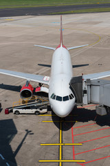 airplane standing at the gate waiting for passengers