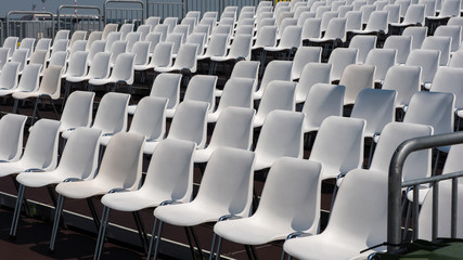 chairs in rows in an open air theatre