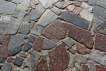 Abstract color stone pavement close-up.