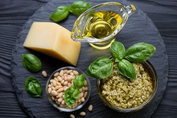 Basil pesto, pine nuts, parmesan, olive oil and basil leaves