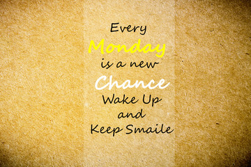 Every Monday is a New Chance wake up and keep smile. Inspirational Quote brown paper texture background.