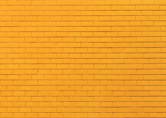Yellow brick wall background.