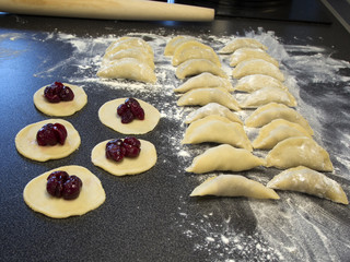 The homemade dumplings with cherries