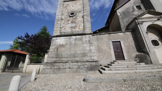 in italy  sumirago  ancient   religion  building    for catholic and clock tower.